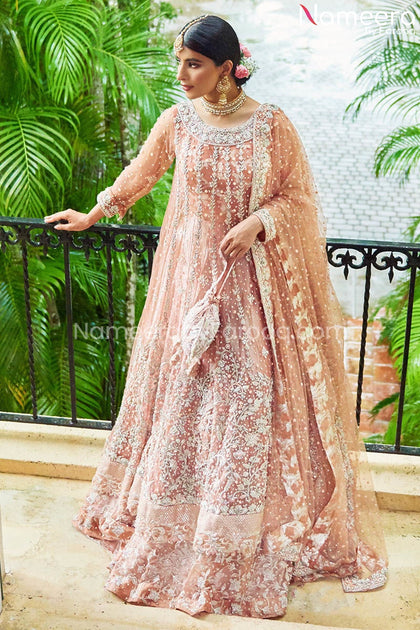 rose gold pakistani bridal dresses in peach colour